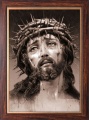 Obraz religijny Jezus Chrystus Umęczony w ramie drewnianej ze złotym paskiem