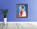 Obraz religijny na płótnie Błogosławiony Ksiądz Jerzy Popiełuszko  w ramie drewnianej ze złotym paskiem
