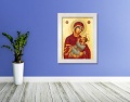 Obraz religijny na płótnie Matka Boża Karmiąca w białej ramie