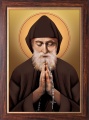 Obraz religijny Święty Charbel w ramie drewnianej ze złotym paskiem