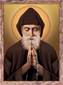 Obraz religijny Święty Charbel  w ramie brązowej z przetarciami